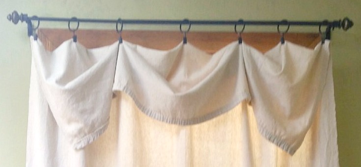 Easy no sew curtains using a painting drop cloth. This may be the easiest and most inexpensive home project I've ever done!