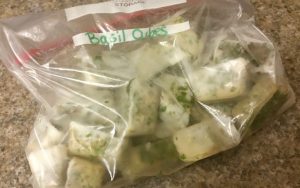 Freezing basil to add to recipes year round is so easy! It's my favorite way to preserve summer.