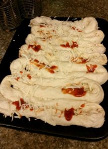 Pizza intestines are a yucky but delicious way to gross out a crowd. 